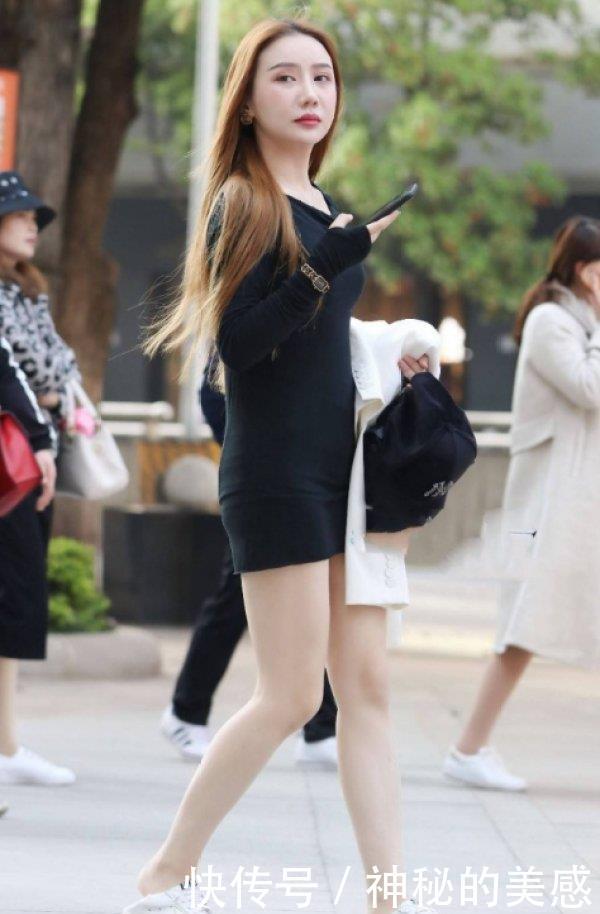 拍美女:打扮时髦的小姐姐,高挑的身材,显得很精神!
