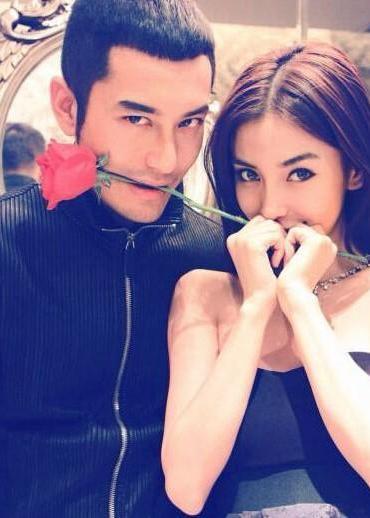 Angelababy返沪抱小海绵现身机场走VIP通道