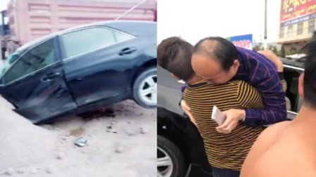 货车侧翻压到小轿车 群众砸窗救出司机