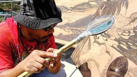 半岛奇闻 艺术家用太阳做颜料, 用放大镜“烤”出画作, 牛人画画不用笔!